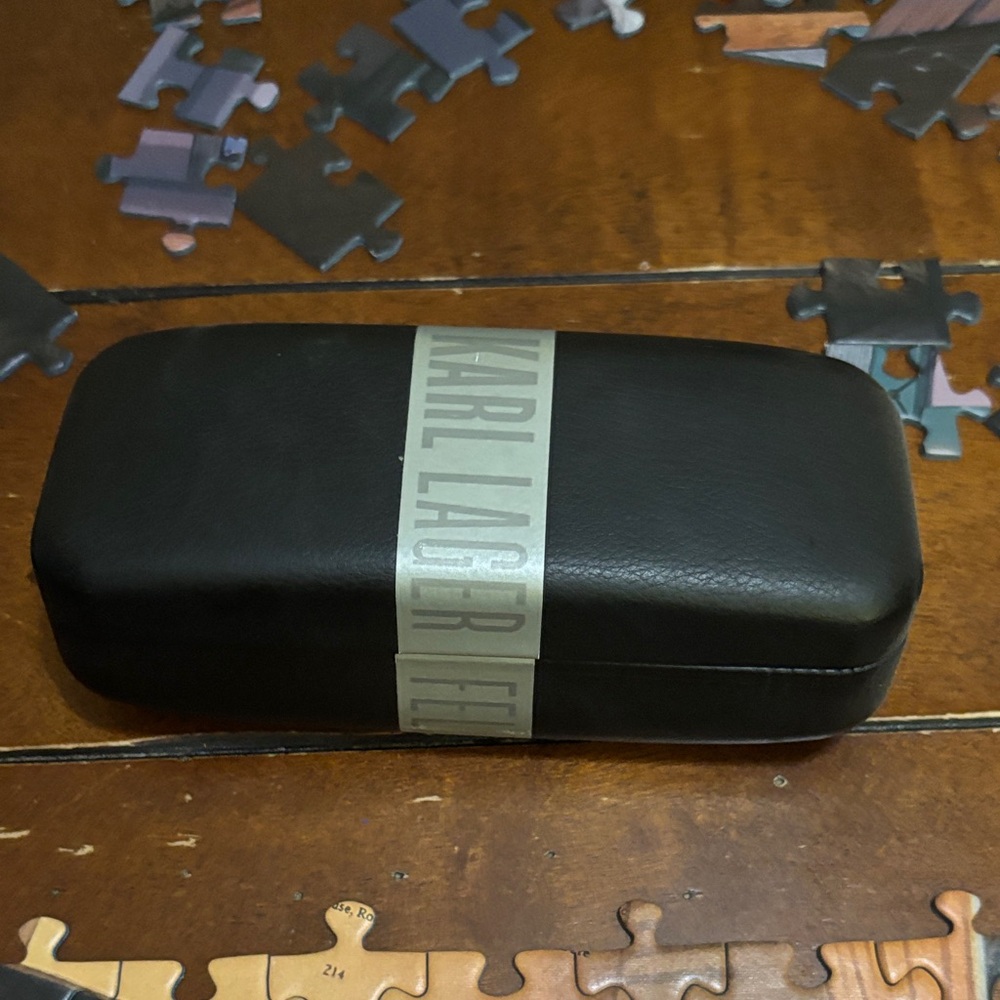 Karl Lagerfeld Black Sunglasses with case and glass cleaner towel.